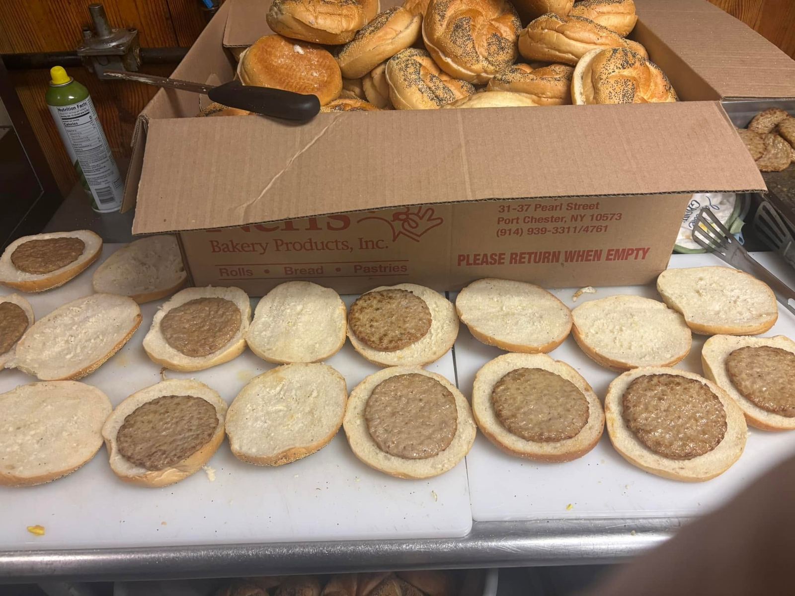 Breakfast sandwich being assembled