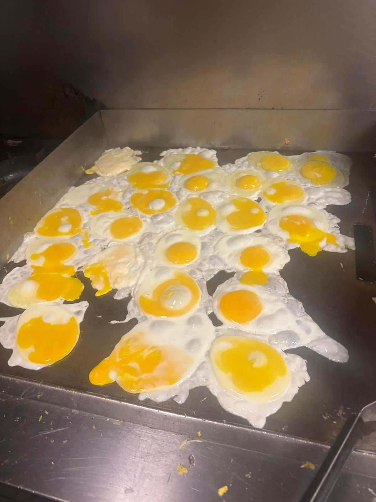 Fried eggs on the griddle