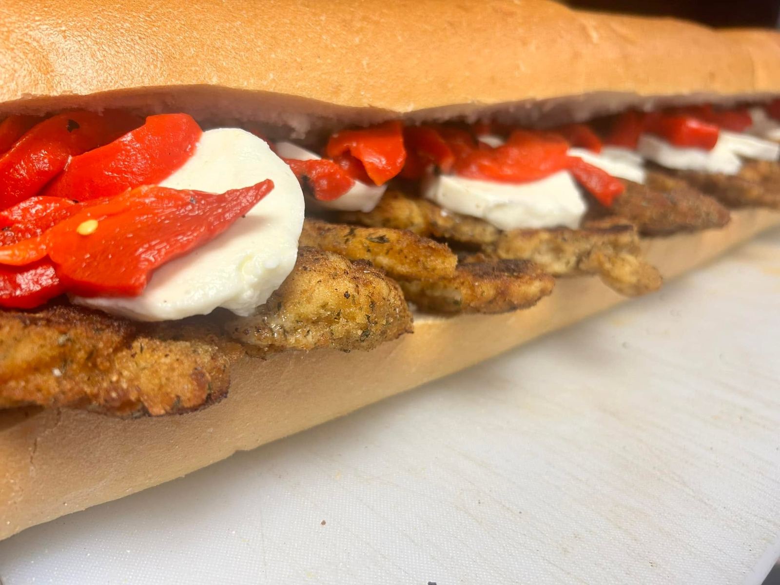 Chicken cutlet sub with mozzarella and roasted peppers